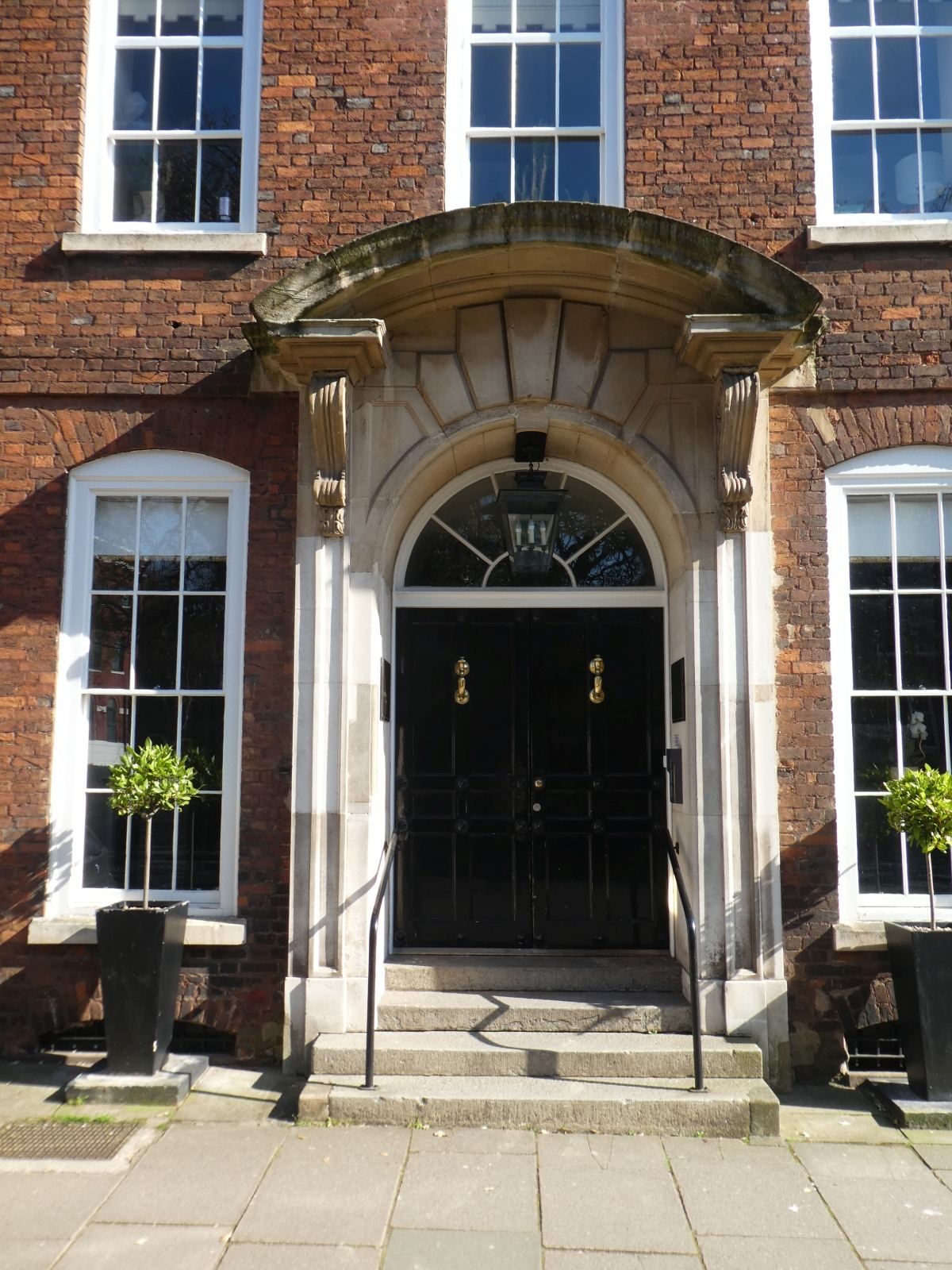 Front door of a red-brick English house